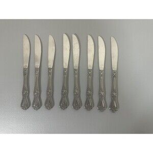 Rogers Co. stainless flatware Rose Set Of 8 dinner knives 8 1/2